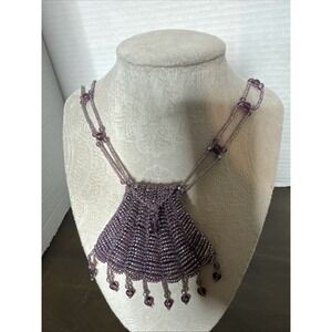 Handcrafted Beaded Purple Necklace With Detailed Pouch Design & Tassel Accent